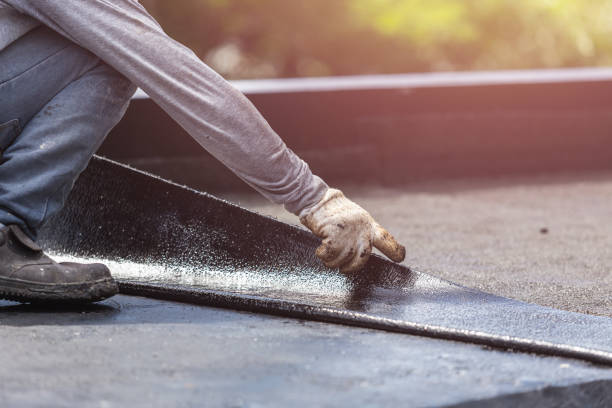 Professional Waterproofing technician working in Absecon, NJ